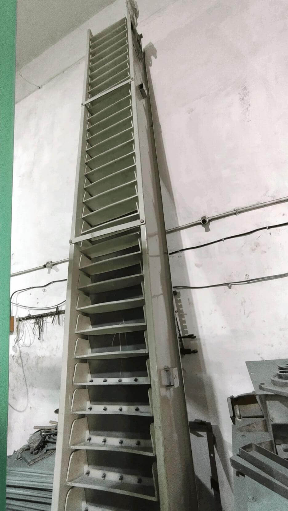 Bucket Lift Elevator for Vertical Grain Conveying – Swastik Technology